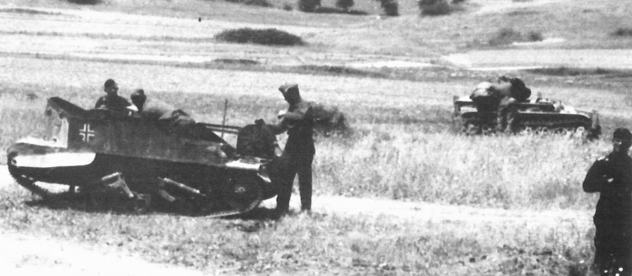 Wehrmacht soldiers prepare one of the Ladungsträger auf Fahrgestell Bren suicide drones for the use, World War II