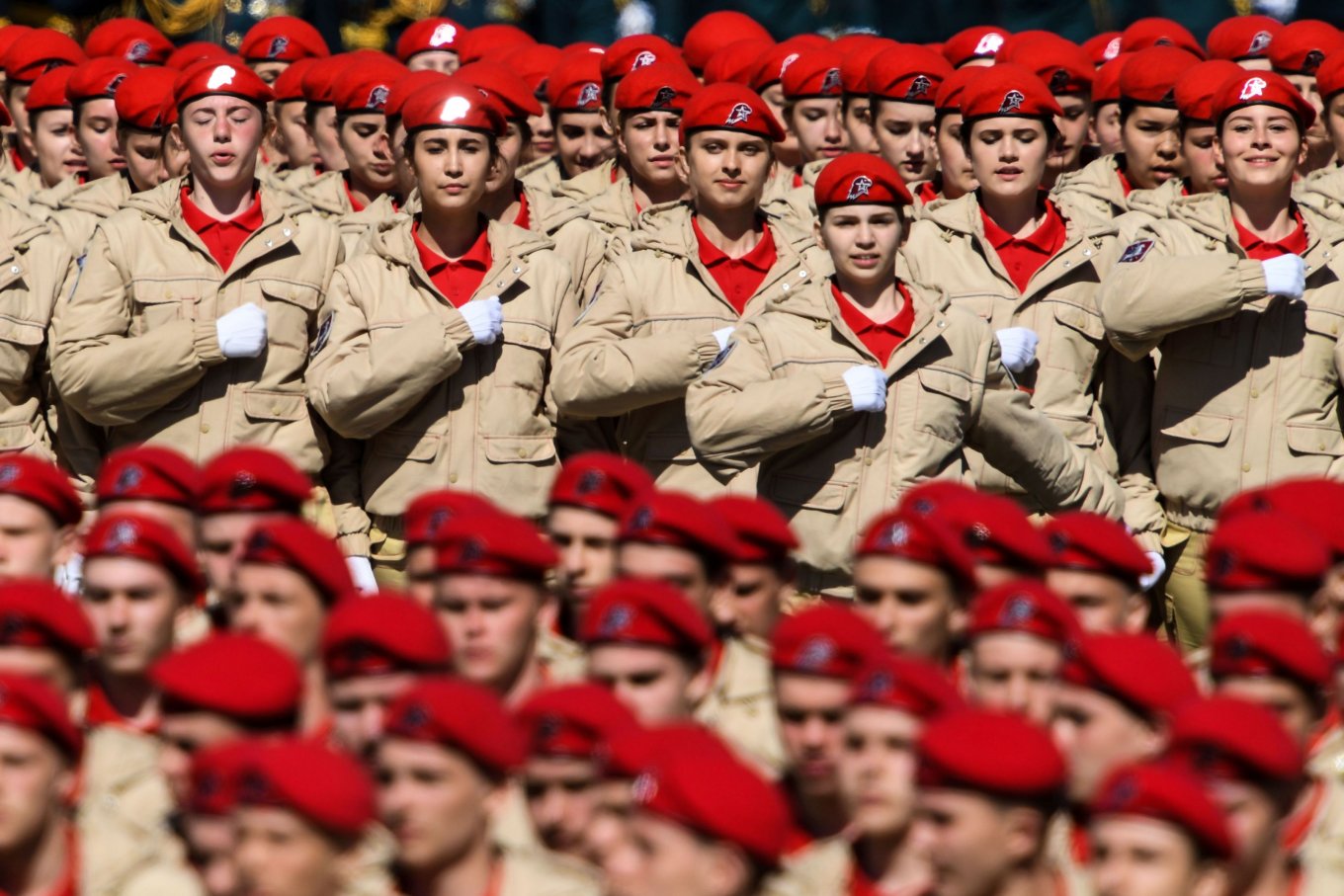 Russia's military-patriotic movement Yunarmiya cadets march at Red Square during a rehearsal for the Victory Day military parade in Moscow, Russia Militarizes Its Secondary Schools Returning Military Training For Schoolchildren, Defense Express