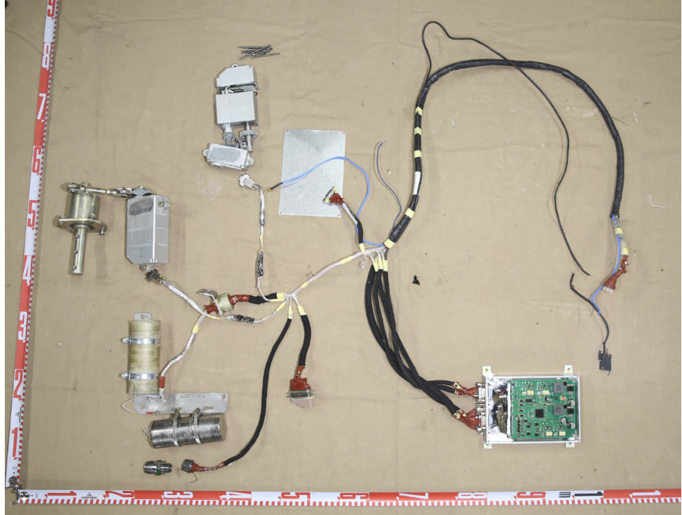 Five main electronic components from a russian guided air bomb dropped in the Orikhiv area in October 2023
