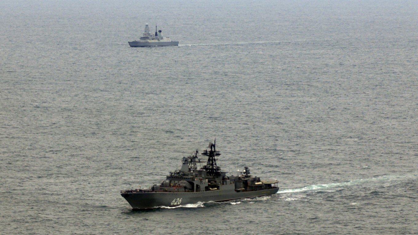 The HMS Duncan destroyer shadowing russian warship Defense Express Royal Navy Destroyer Shadows russian Warship Under NATO Command