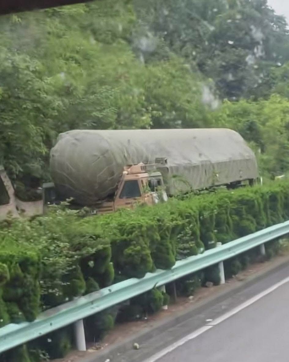 Chinese DF-41 ICBM launcher camouflaged for forested terrain Defense Express Satellite Deception: China Disguises Nuclear ICBM Launchers as Construction Cranes