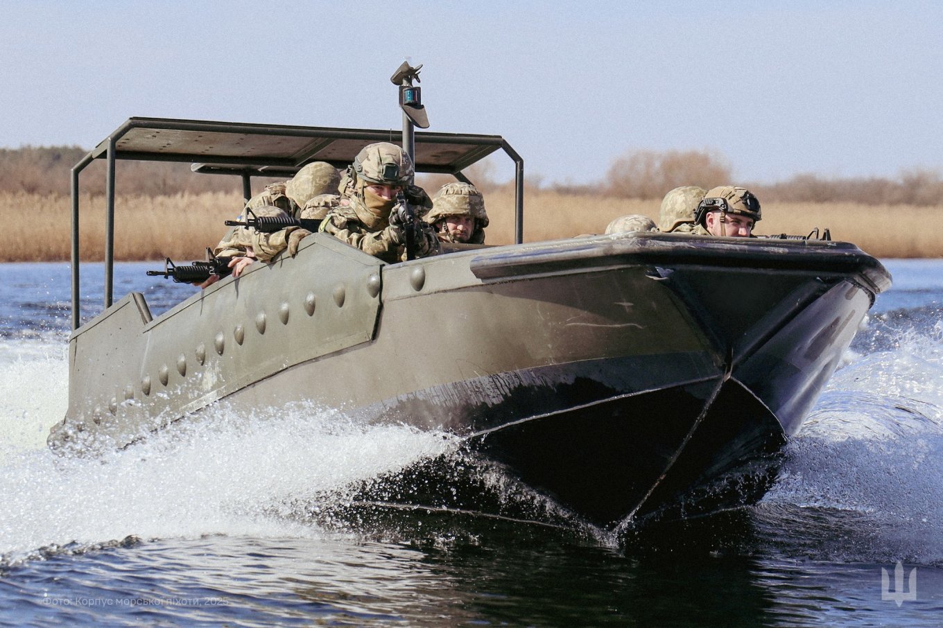 Ukrainian Marines aboard a motorboat