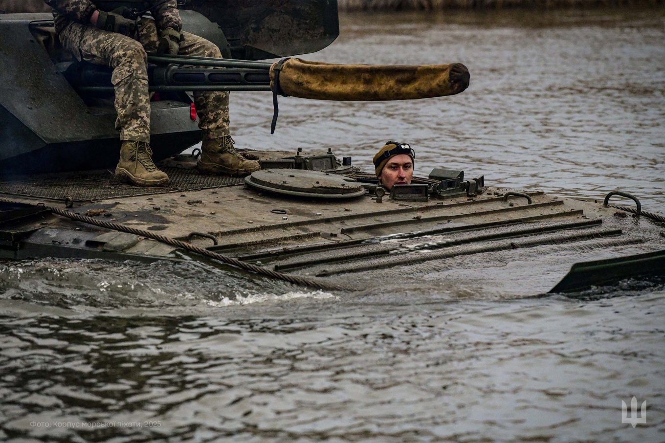 Naval infantry units practiced maneuvering heavy equipment across water obstacles in preparation for complex battlefield scenarios Defense Express Crossing the Line: Ukrainian Marines Test Rapid Mobility Over Water
