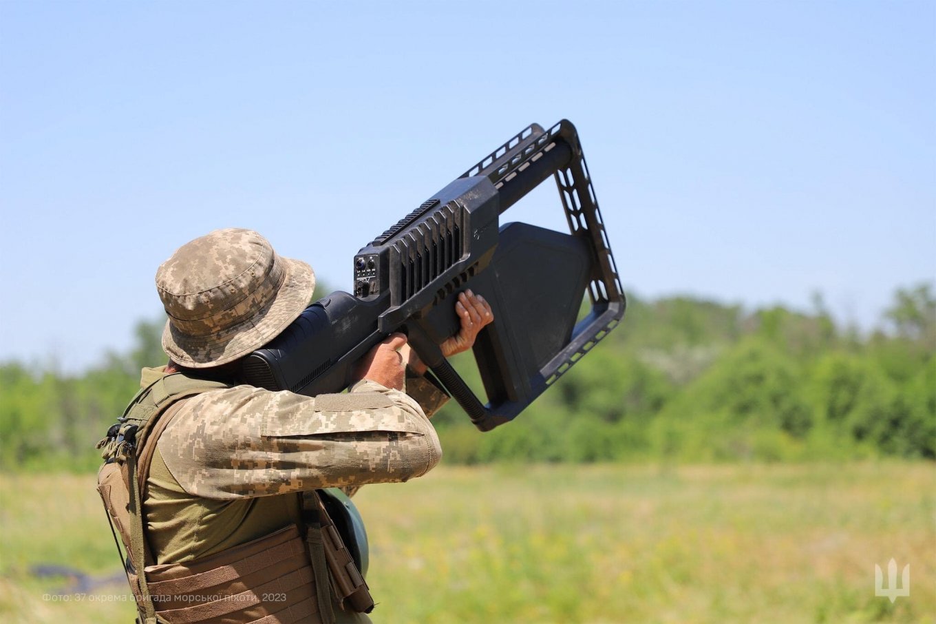 Ukrainian marine holding an anti-drone gun