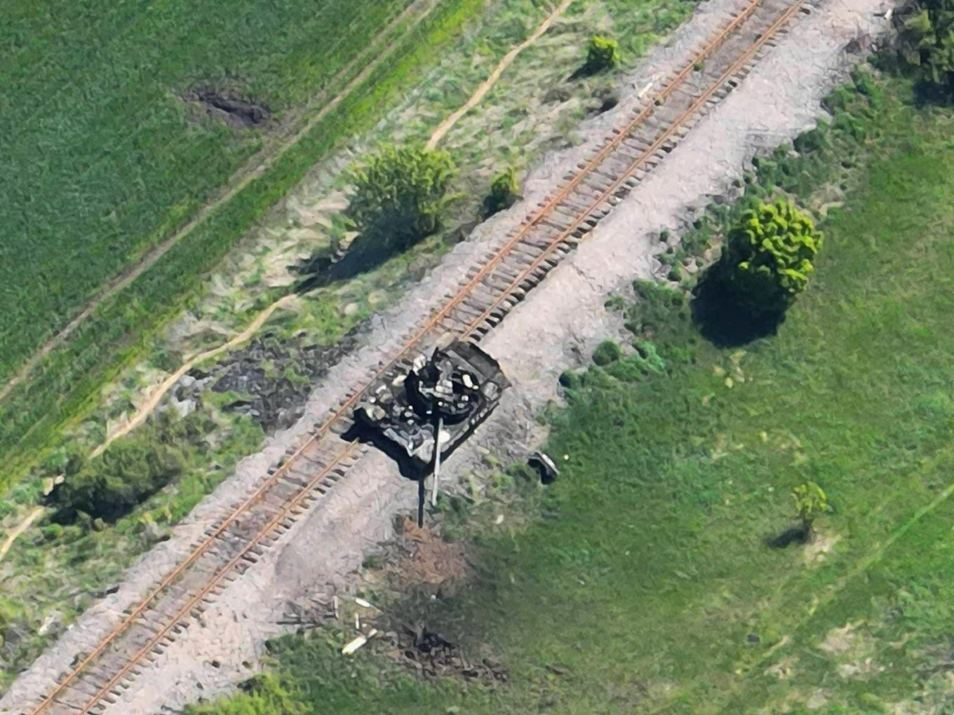 Aerial view of a Russian T-72B MBT destroyed by the Ukrainian 53rd Mechanized Brigade, Defense Express