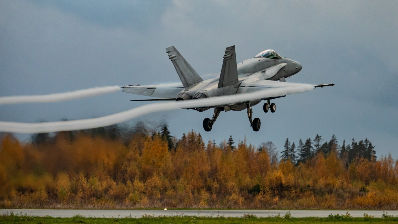 Finnish Air Force F/A-18 Hornet takes off from the runway