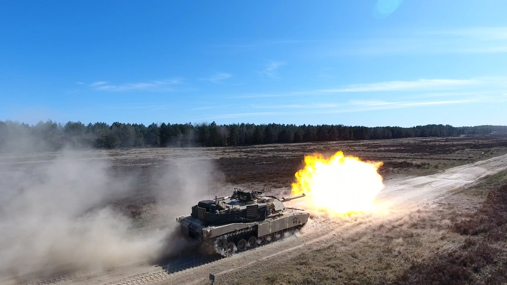 M1 Abrams live firing M829 120mm DU shells during an exercise
