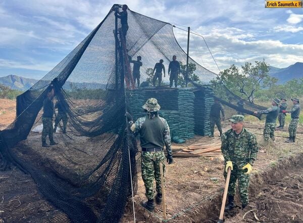 Colombian soldiers installing anti-drone nets, January 2026