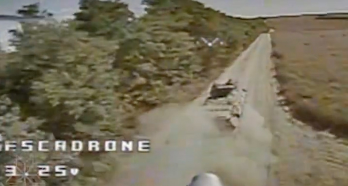 An FPV drone chasing down a russian BTR