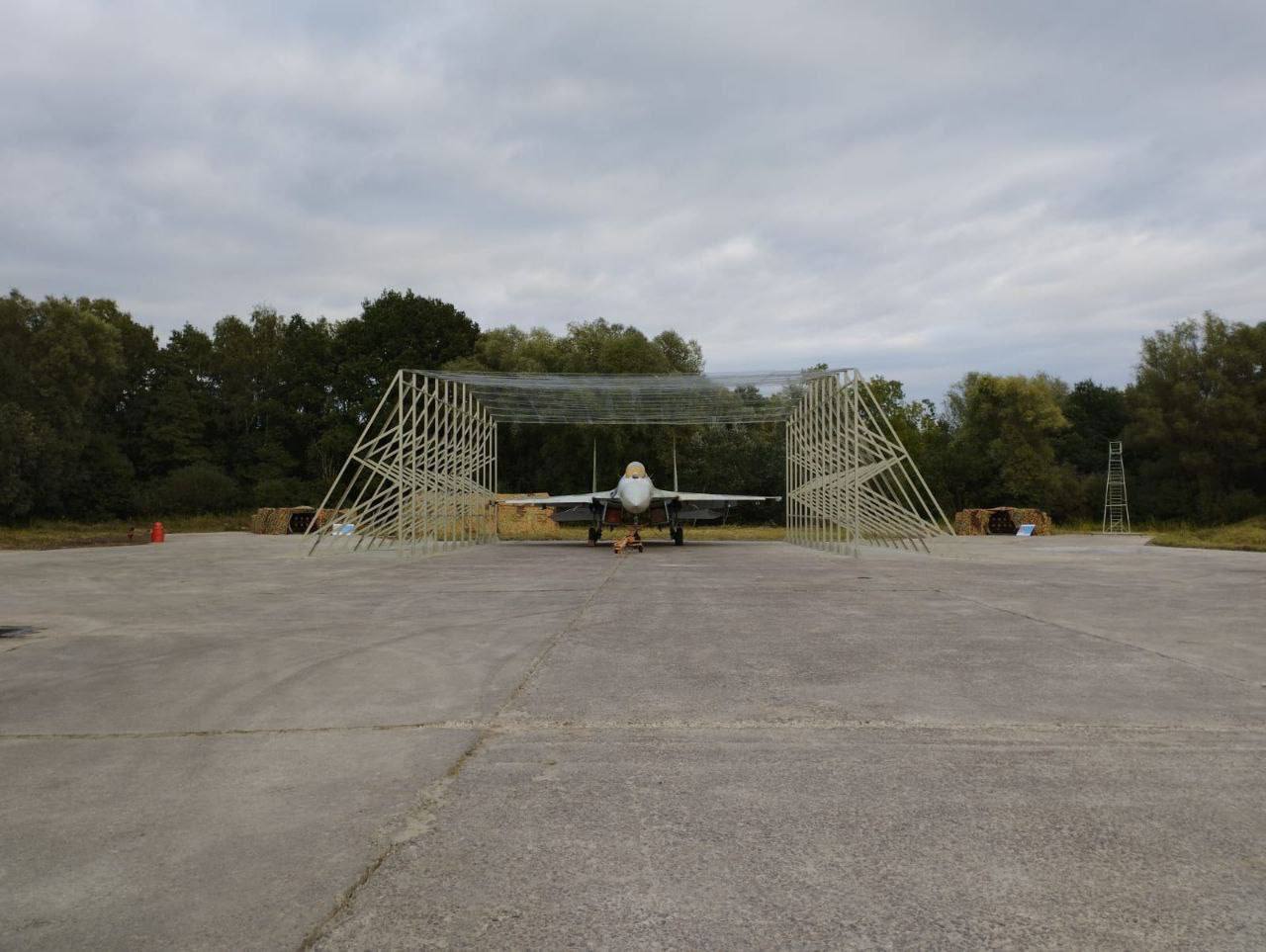 Su-27 under an improvised anti-drone canopy, September 2023
