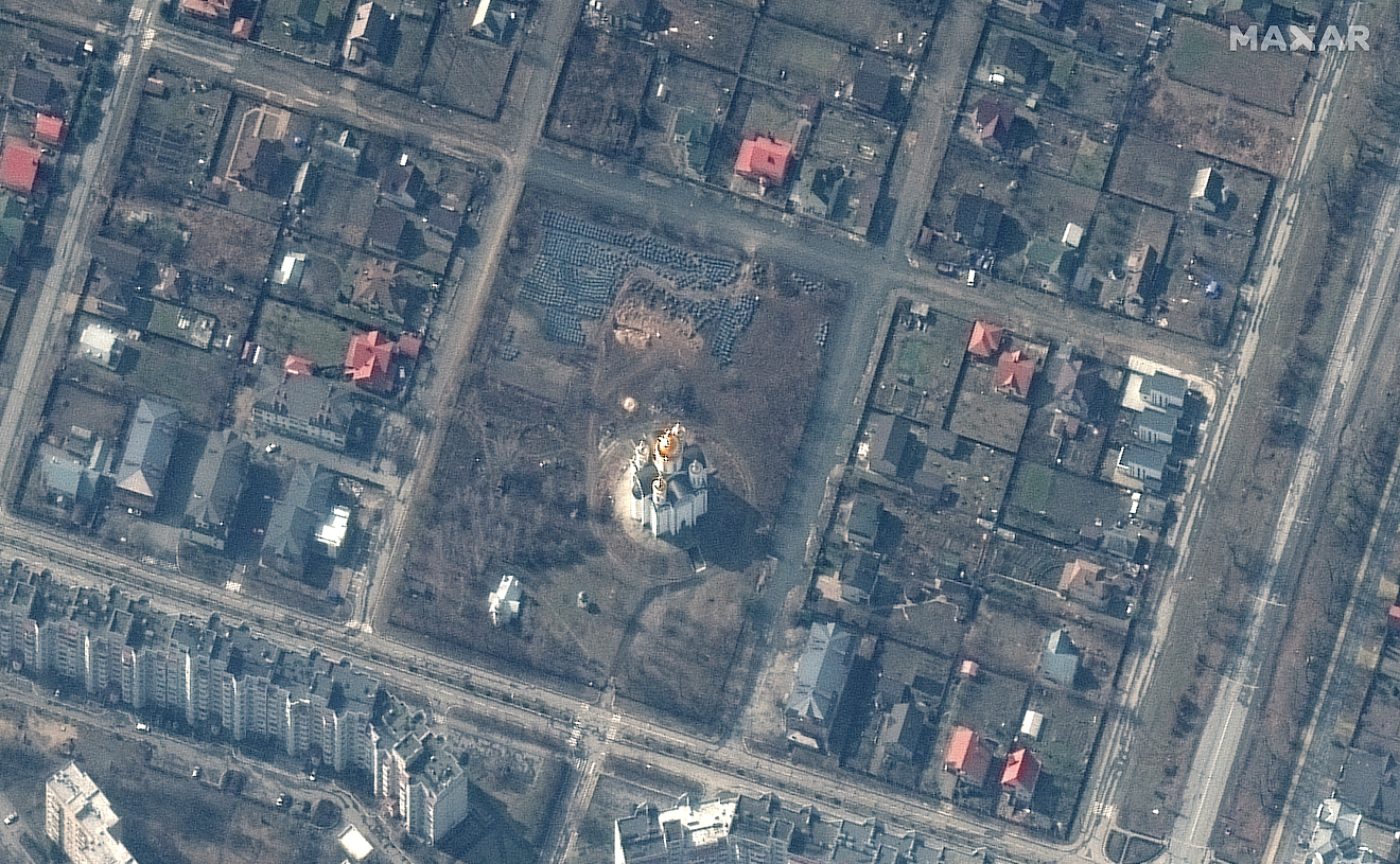 Maxar captured an image of mass grave in Ukraine. Satellite image ©2022 Maxar Technologies