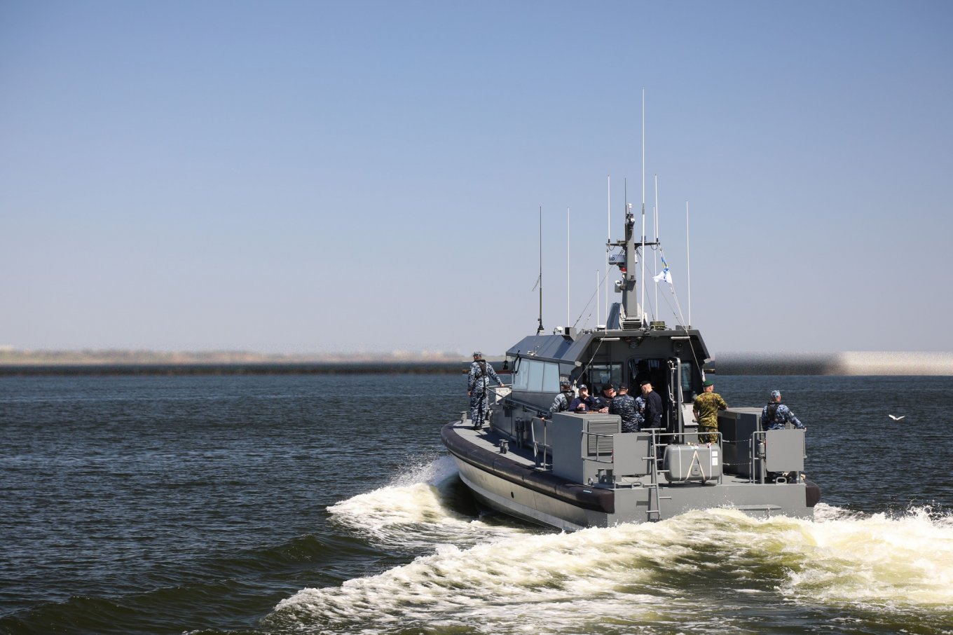 Ukrainian Navy officials take Estonian delegation aboard for a voyage during the flag raising ceremony on the Irpin and Reni ships, May 2nd, 2024 / Defense Express / Former Estonian NAVY 18 WP Ships Headed Out for The First Combat Duty in Ukrainian Navy (Video)
