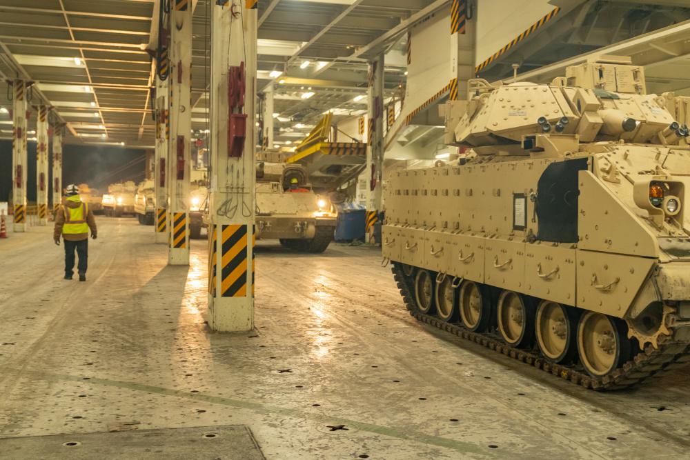 A convoy of Bradley Fighting Vehicles load onto the ARC Integrity Jan. 25, 2023, at the Transportation Core Dock in North Charleston, South Carolina, Defense Express