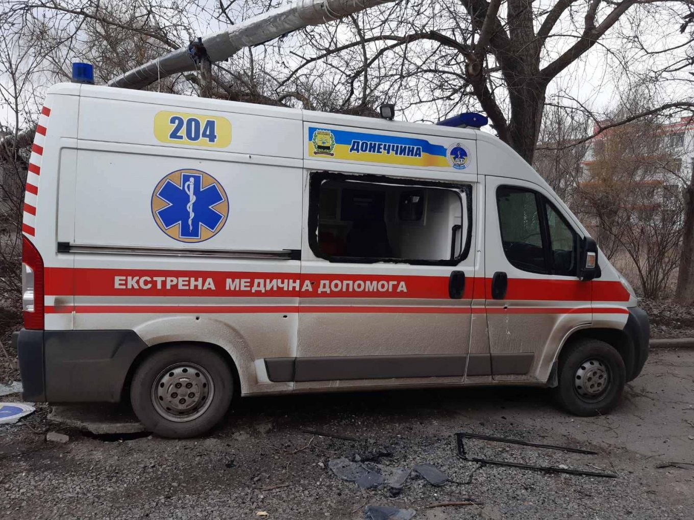 Defense Express / An ambulance after getting shot by Russian military / Ukraine Withstands Russian Aggression on Day Two of Large-Scale War – Live Updates