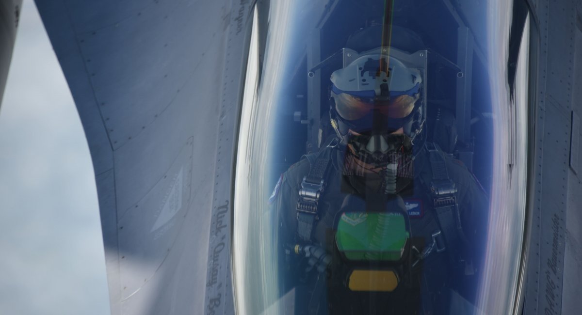 a pilot inside the F-16 cockpit, Defense Express