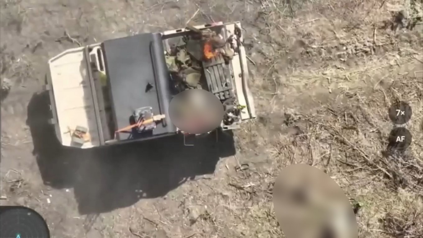 A bomber drone loiters above a damaged russian buggy. Events of the recent assault on the Kurakhiv axis, published July 30th, 2024 / Defense Express / Usage of Buggies and Quad Bikes Will Be Scaled Up: russian Army Centers Invite For Driver Course