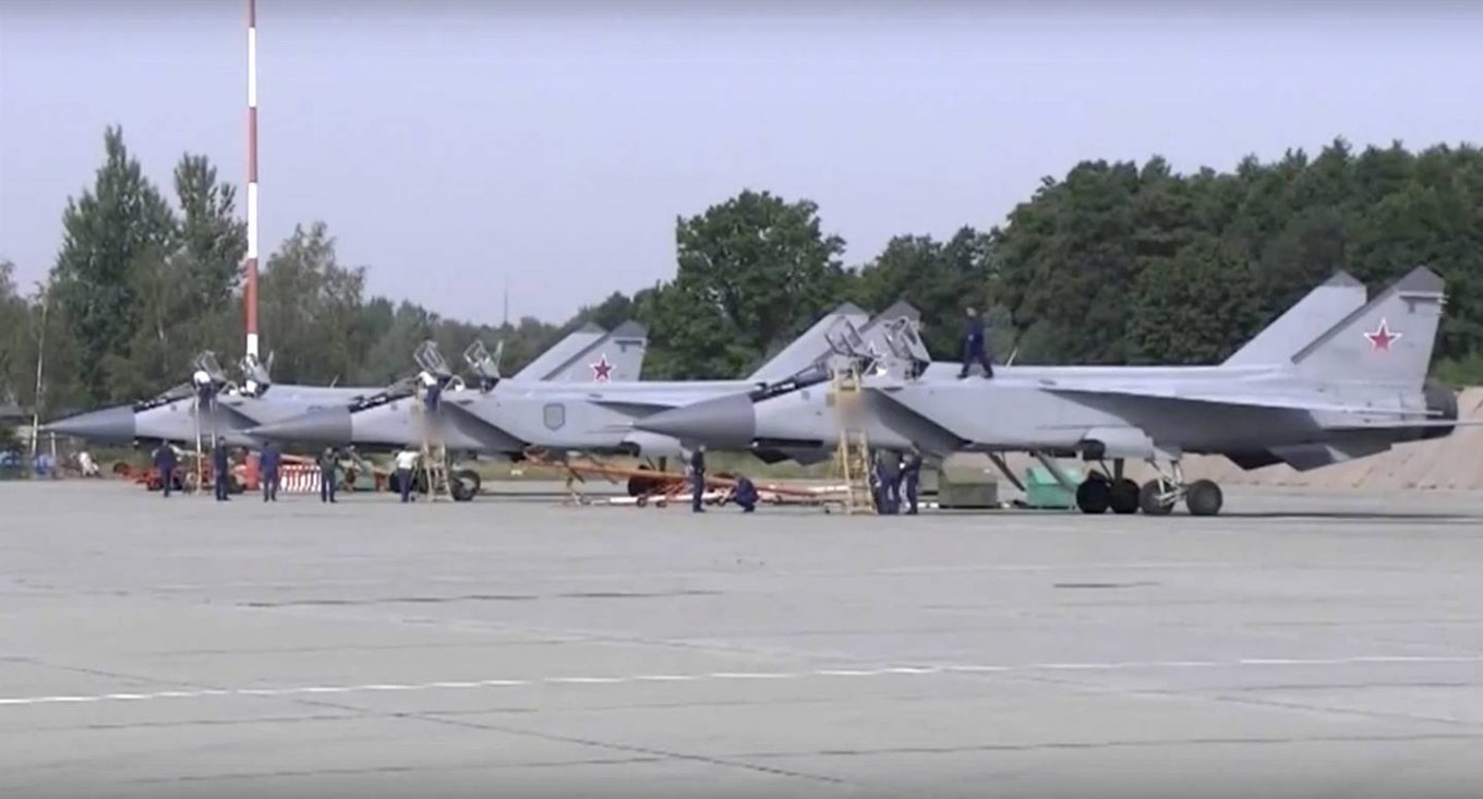 Three Russian MiG-31 jets are seen after landing at the Chkalovsk air base in the Kaliningrad region. The Russian Defense Ministry said three MiG-31s equipped to carry Kinzhal hypersonic missiles were deployed to the region as part of "additional measures of strategic deterrence." (Russian Defense Ministry Press Service via AP)