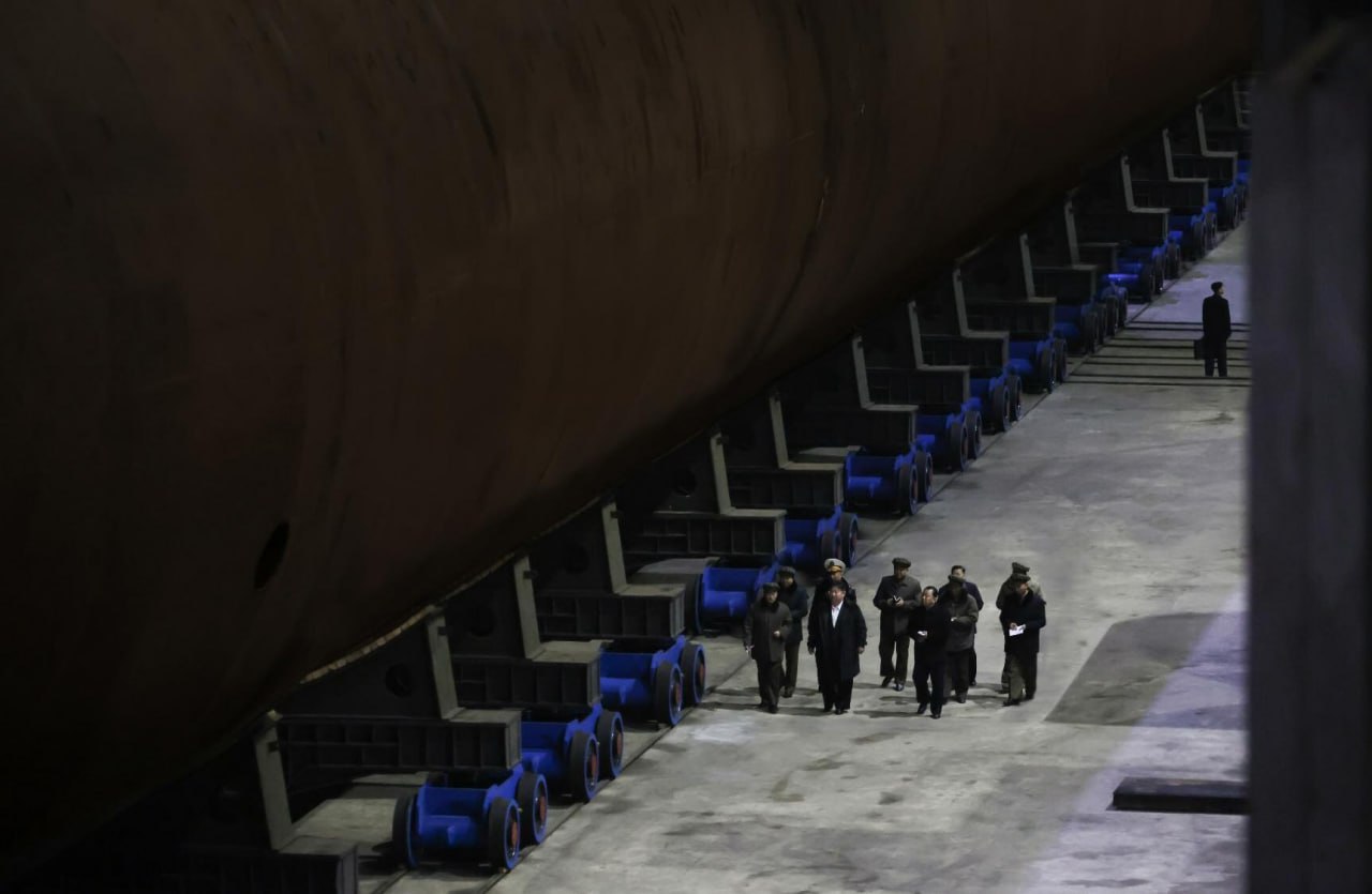 Kim Jong-un visits construction of North Korea’s first nuclear submarine, March 2025 / Photo credit: KCNA