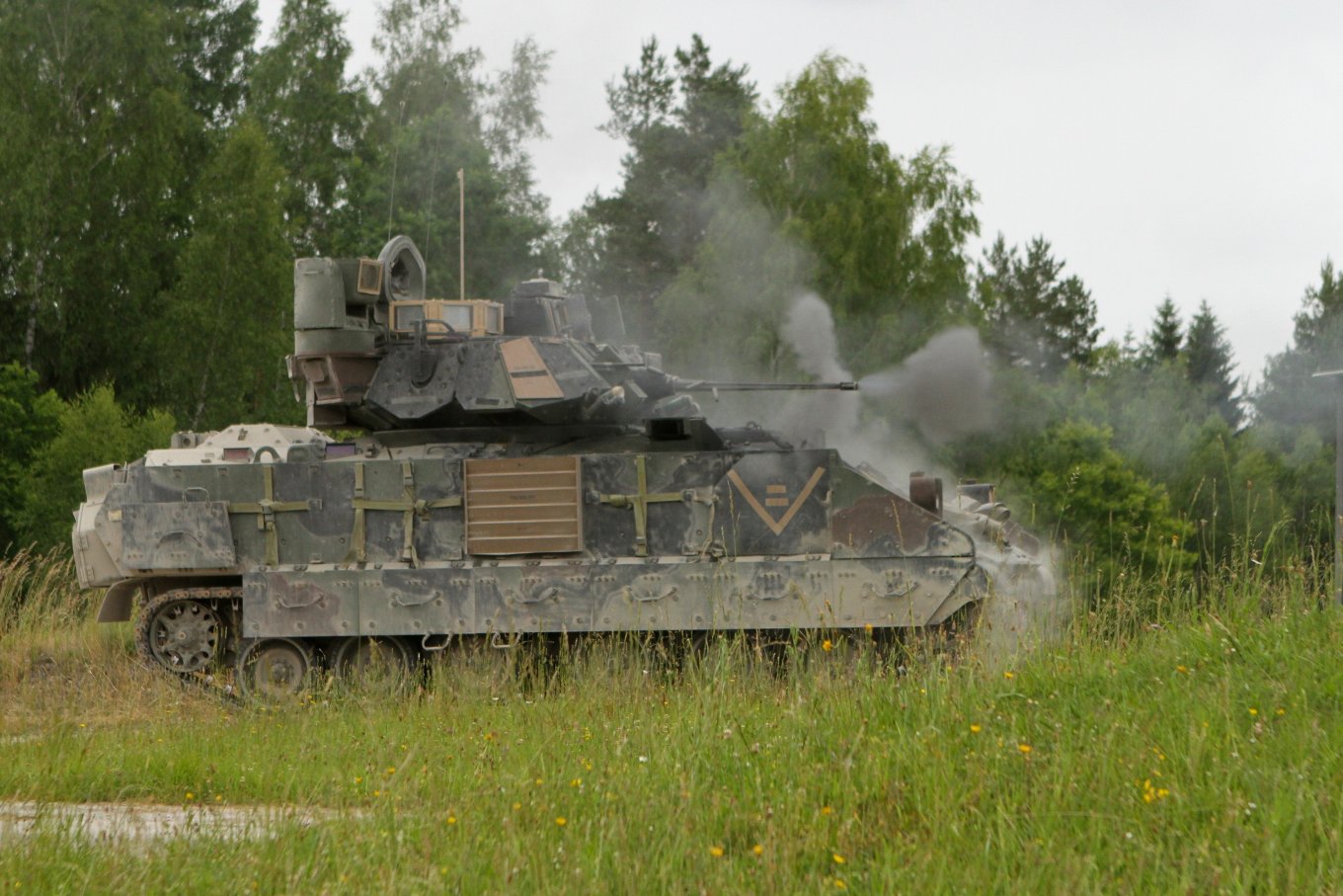 U.S. soldiers engage targets with their M2 Bradley Fighting vehicle during squad live-fire certification training as part of Exercise Combined Resolve II at the Joint Multinational Readiness Center in Hohenfels, Germany, June 20, 2014 Defense Express The U.S. Provides Critical Security Assistance to Ukraine, Allocating Over $325 Million in Weaponry