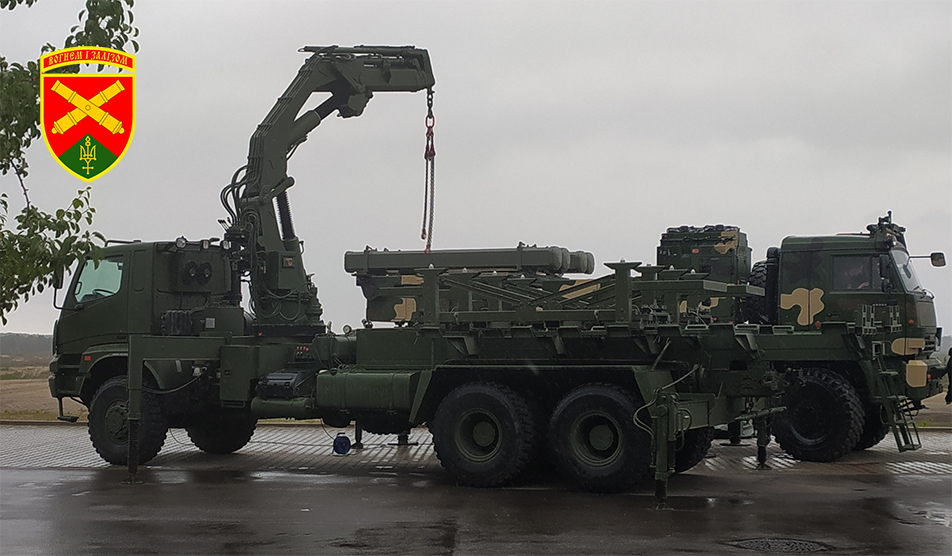 MBRL of the 49th Artillery Brigade is loaded with rockets