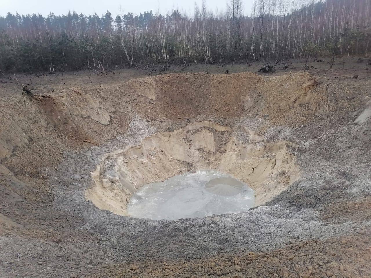 Crater created by a russian missile attack, believed to be the consequence of a KN-23 missile hit