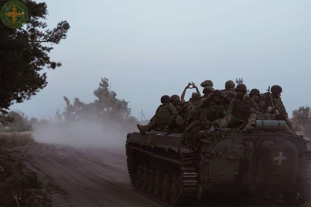 Soldiers of the Iron Wolves battalion of the 1st Special Purpose Brigade moving out to the frontline