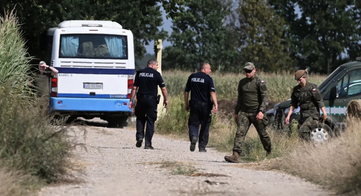 Polish security forces at the crash site of the russian drone