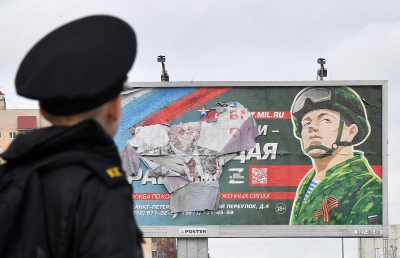 Billboard is promoting contract army service in Saint Petersburg, Russia.Photographer: Olga Maltseva/AFP/Getty Images