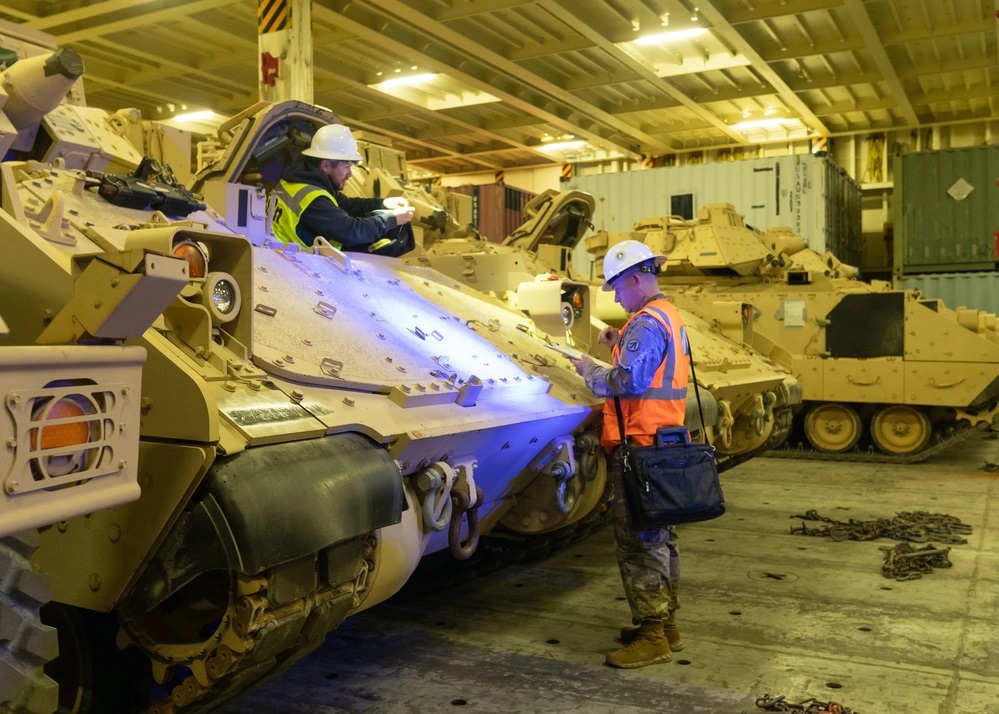 M2 Bradley IFVs for Ukraine prepare for transfer at the Transportation Core Dock, January 2023 / Defense Express / Audit Shows Cost of U.S. weapons for Ukraine Was Overstated By Billions