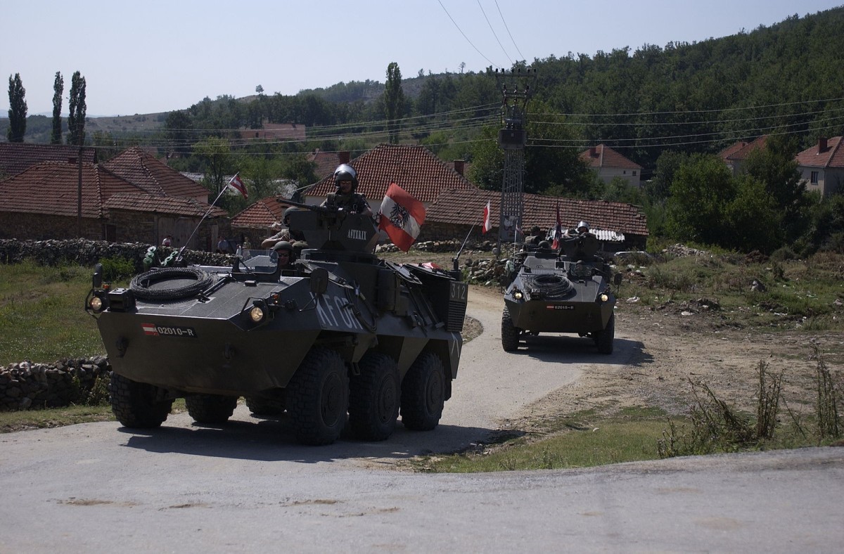 Austrian soldiers in Pandur APCs as part of the KFOR mission in Kosovo, With 56 Leopard 2A4 Tanks and 13 Eurofighters, Austria Now Considers Joining NATO