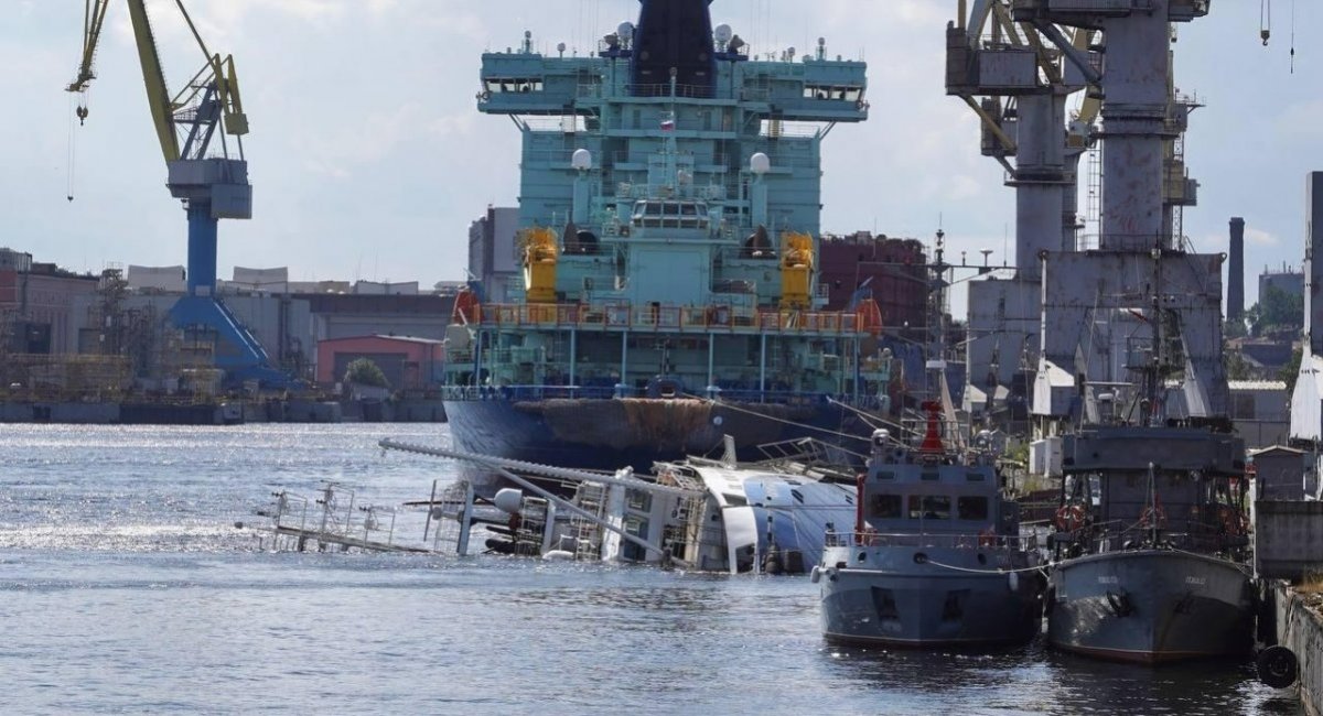 Capsized Kapitan Ushakov at the pier