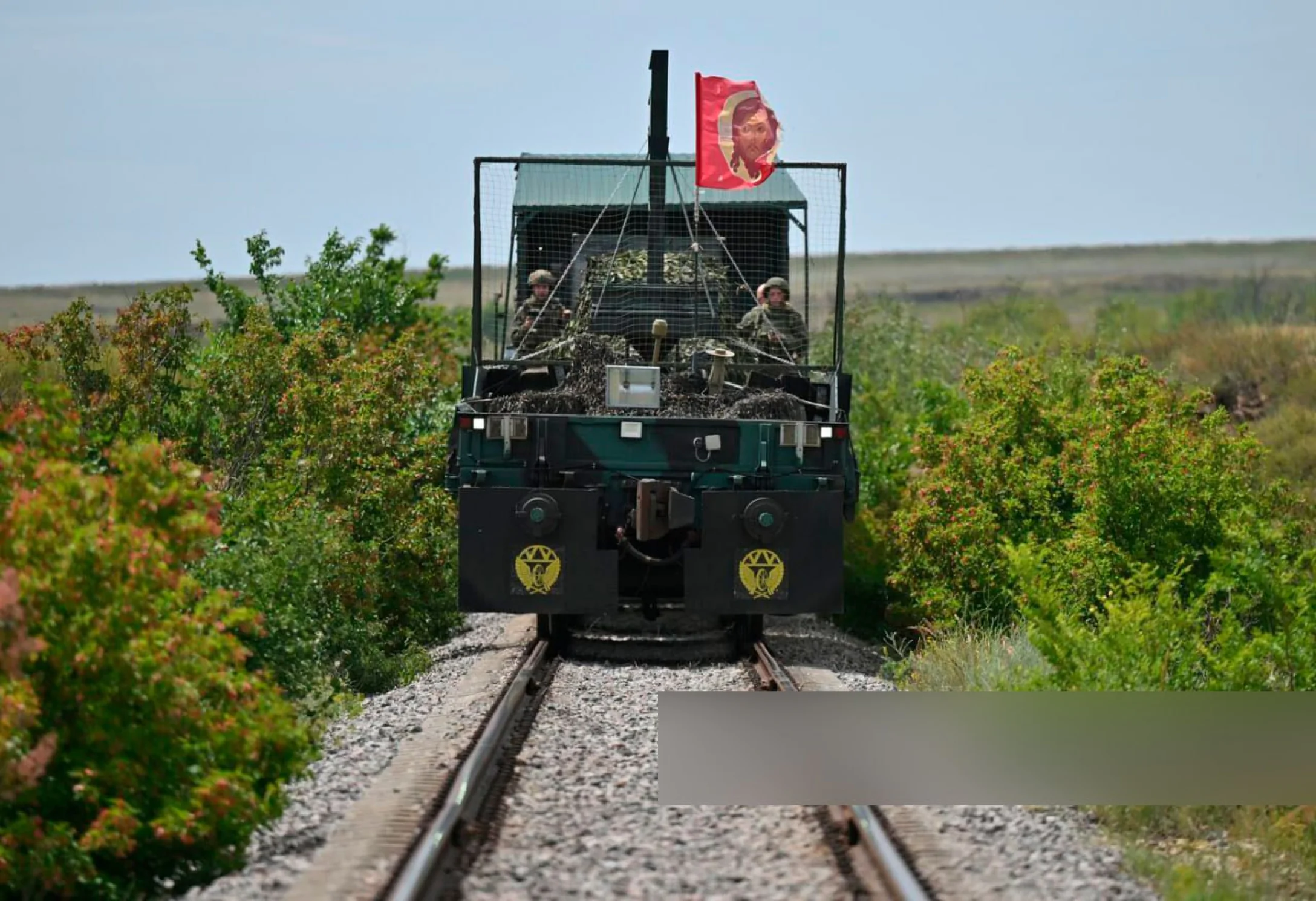 The Yenisei train Defense Express russia Shows Off the Yenisei Armored Train with the ZU-23-2 Cannon, BMP-2 Fighting Vehicle, and NSV Utyos Gun