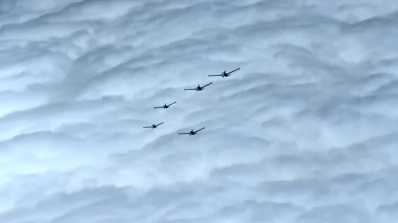 Several K2 strike unmanned systems fly in formation during trials