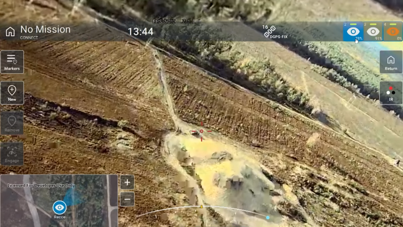 FV-014 interface and camera image, tank hull positioned as training target near earth berm