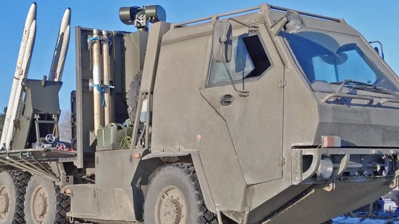 Surface-to-air missile system with AIM-132 ASRAAM interceptors installed on a SupaCat truck