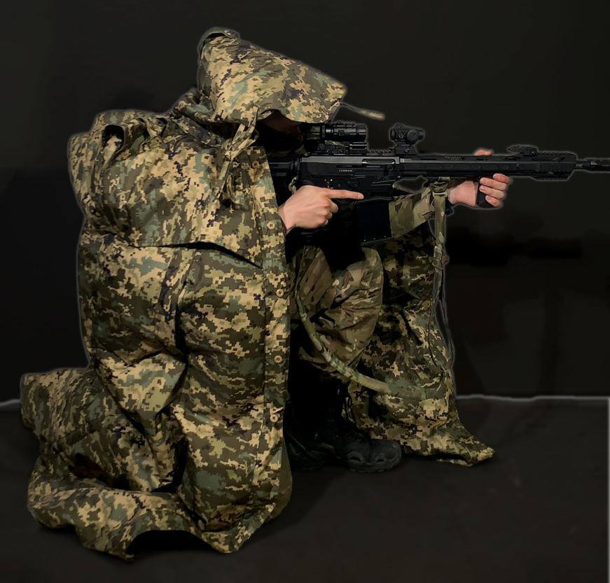 A Ukrianian soldier wearingthe new heat concealing cape