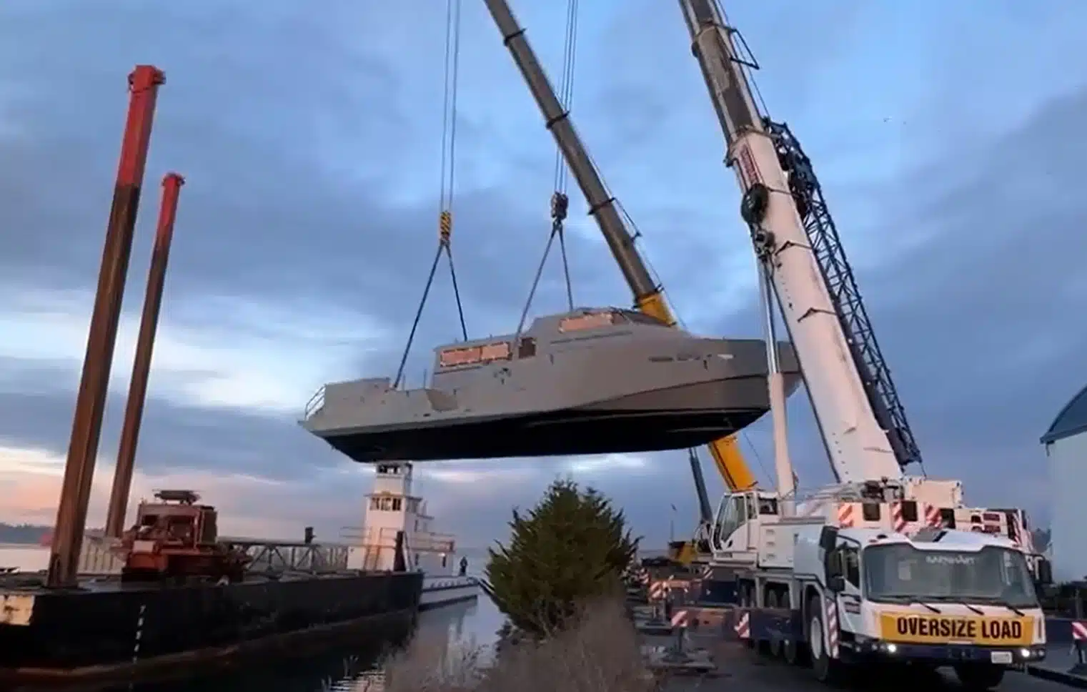 First one of the Ukrainian Navy Mark VI boats is being loaded on a barge, January 2023