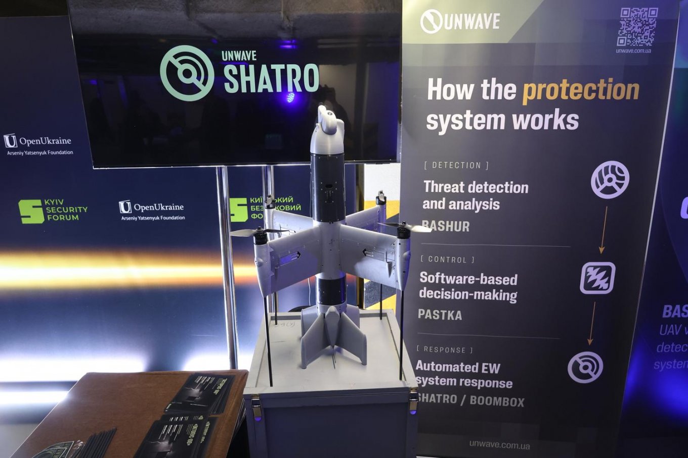 UNWAVE stand — a company specializing in the development, production, and integration of electronic warfare solutions for protection against unmanned threats — at the Defense Technologies exhibition during the Kyiv Security Forum 2026