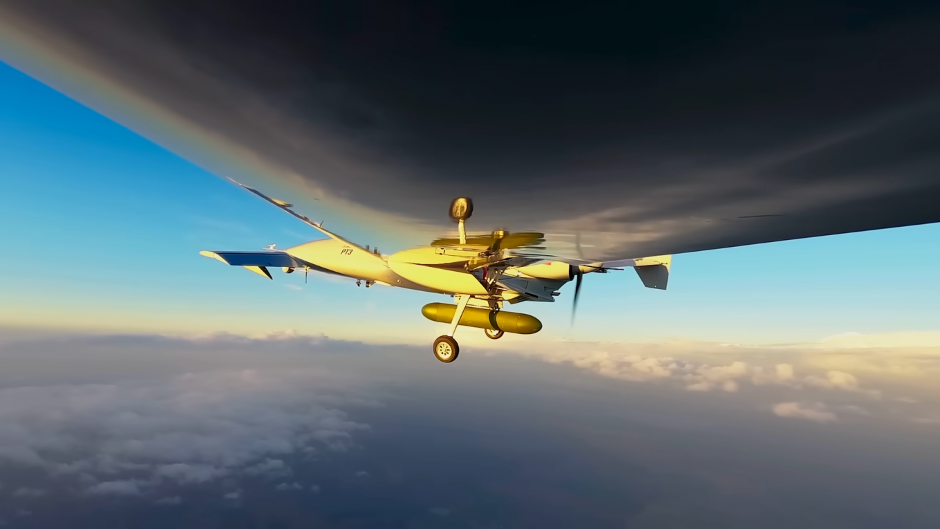 K2 strike unmanned system with suspended container where additional cameras for autonomous navigation by terrain relief comparison appear located / Video frame