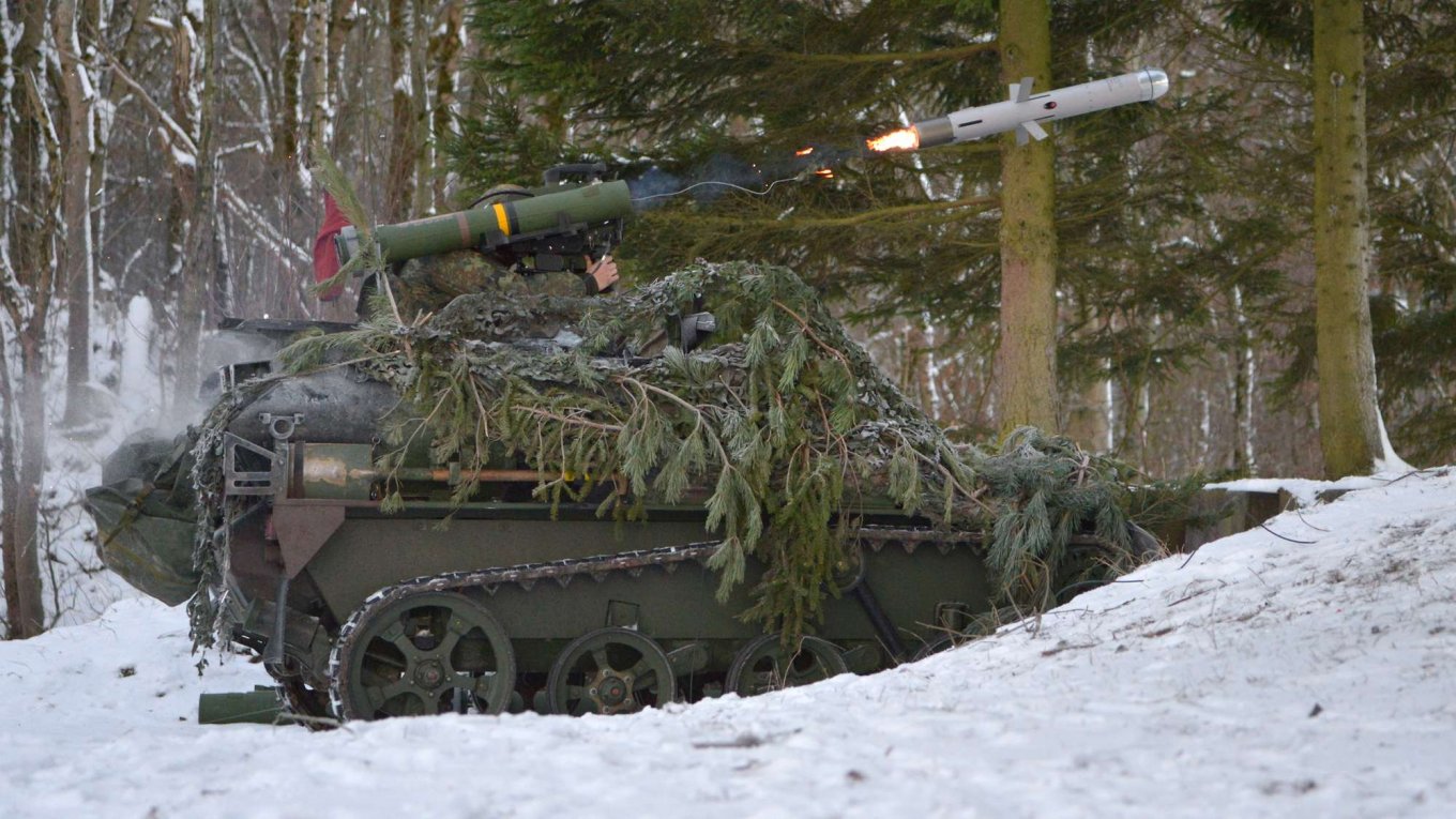Illustrative photo: German soldiers operating a Wiesel 1 armored vehicle armed with TOW AT missile