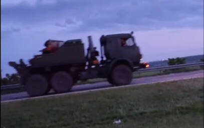 A vehicle with special equipment purport for, maybe, evacuation and repairs on KamAZ chassis in a column moving, presumably, toward Rostov-on-Don, on the morning of June 24, 2023