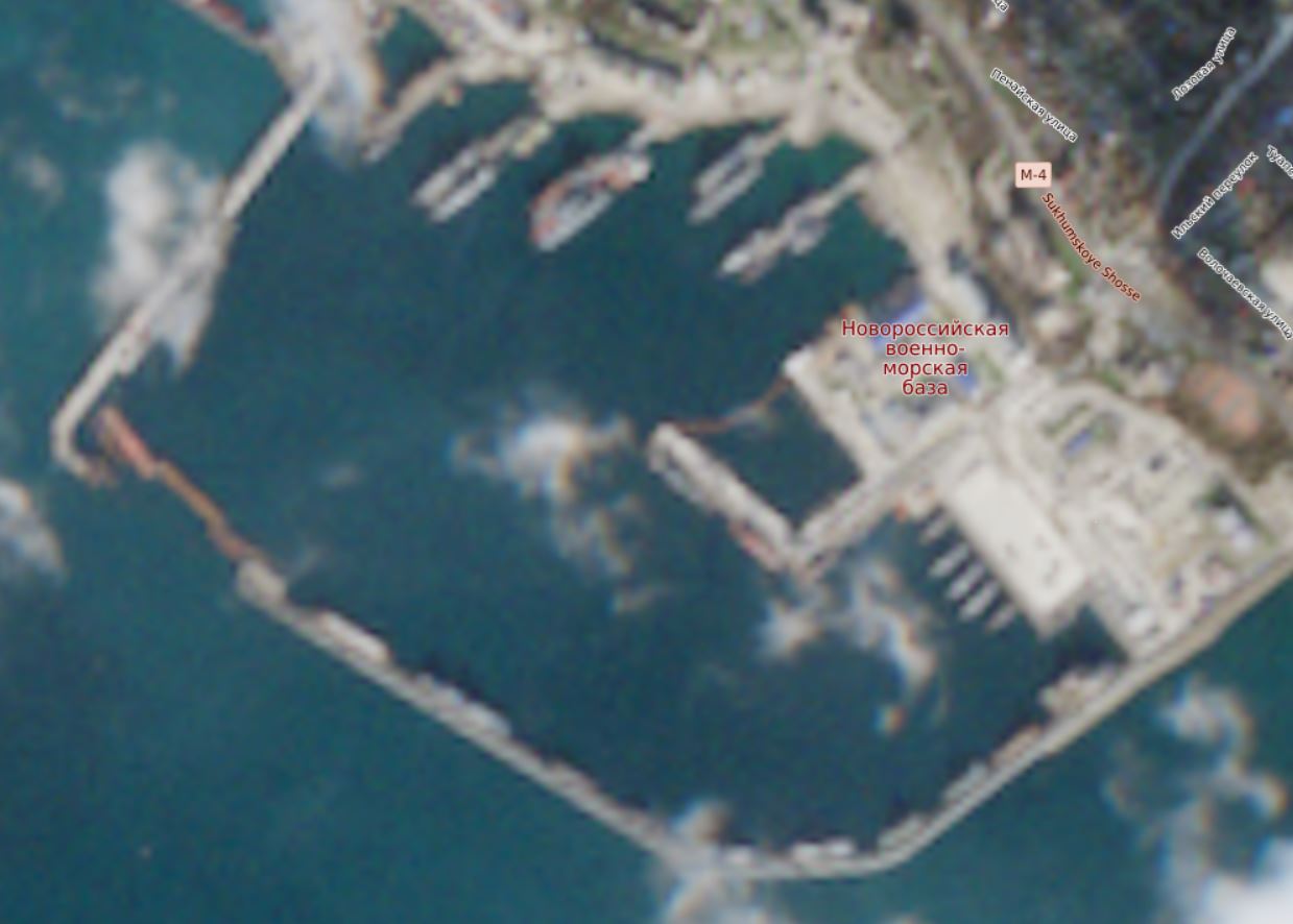 Satellite image of the port of Novorossiysk dated December 25 shows a new boom barrier in the inner harbor, as well as barges at the entrance to the bay Defense Express russia Adds Second Layer of Harbor Defenses After Submarine Hit in Novorossiysk