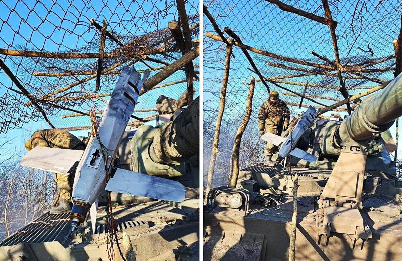 Ukrainian soldiers use anti-drone nets to protect their positions from russian Lancet drones, February 2023