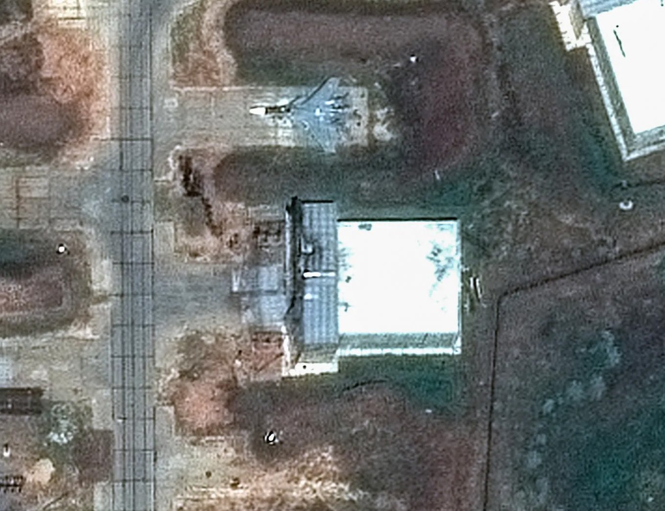 Satellite Images Reveal How Ukrainian Drones Breach russia's New Concrete Aircraft Shelters to Destroy Fighter Jets Inside