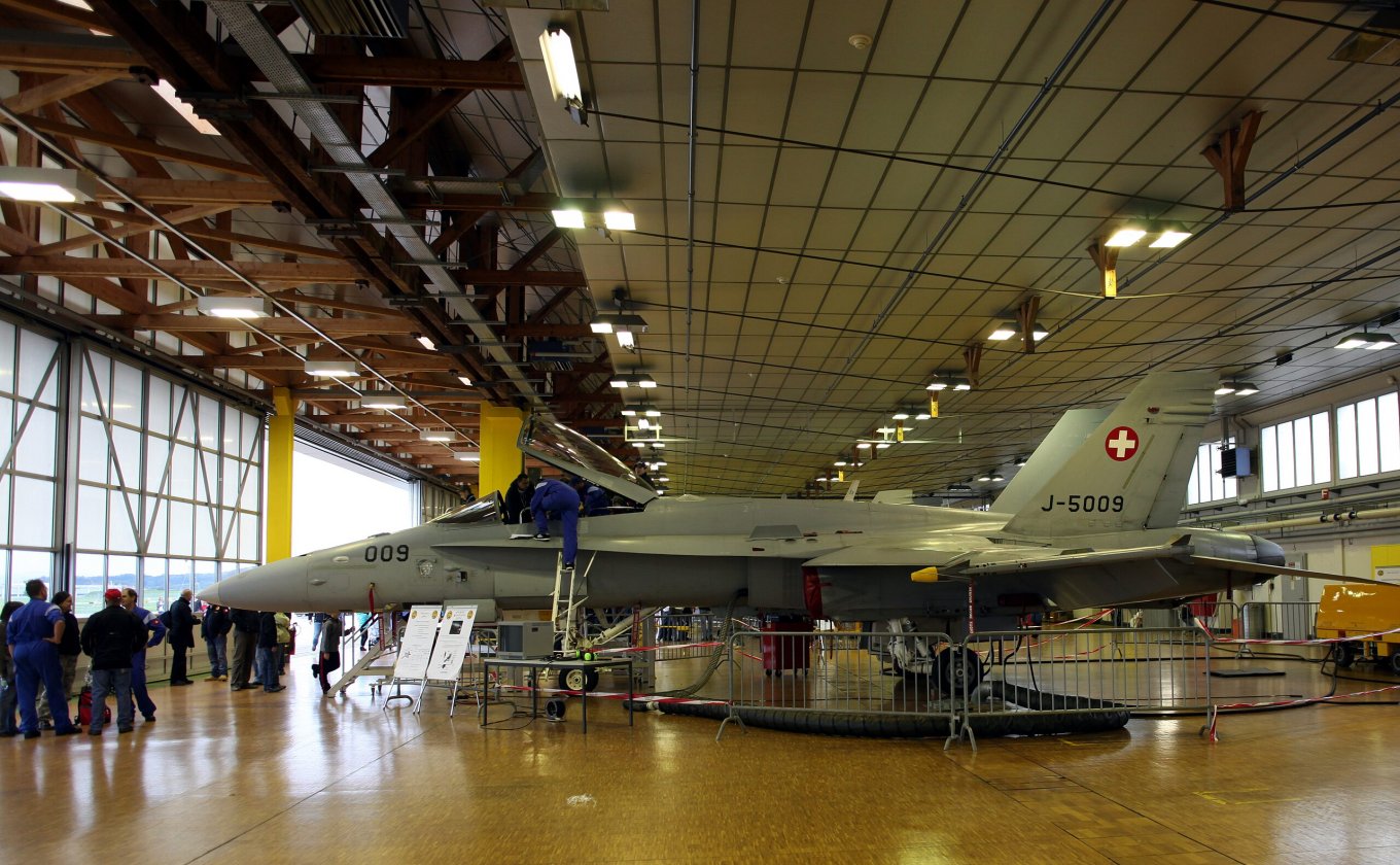 Swiss F/A-18 fighter in hangar at Payerne airbase during open house day
