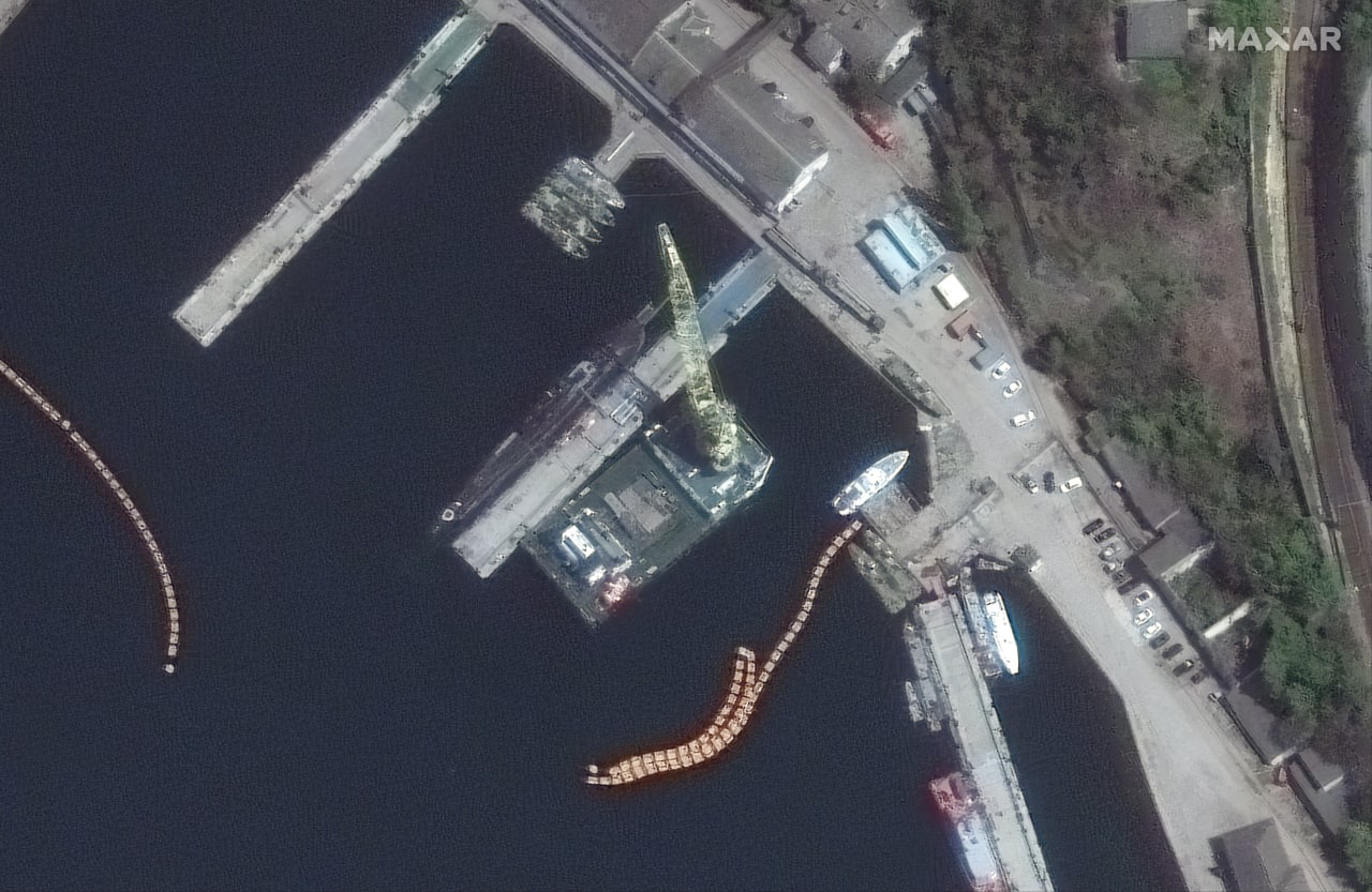 Kalibr cruise missiles are being loaded onto a russian submarine in the temporary occupied Crimea, June 2022