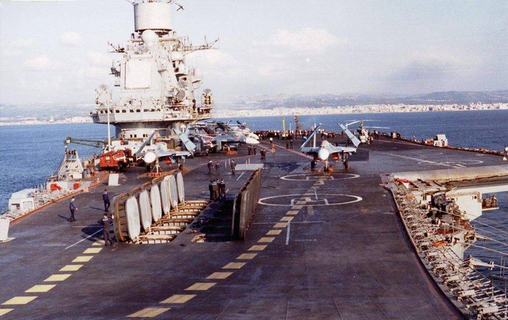 Archive photo: open hatches of launch silos for the P-700 Granit anti-ship missiles aboard Admiral Kuznetsov / Defense Express / Defunct Kuznetsov Carrier Considered for Sale Instead of Scrapping: Who Might Buy
