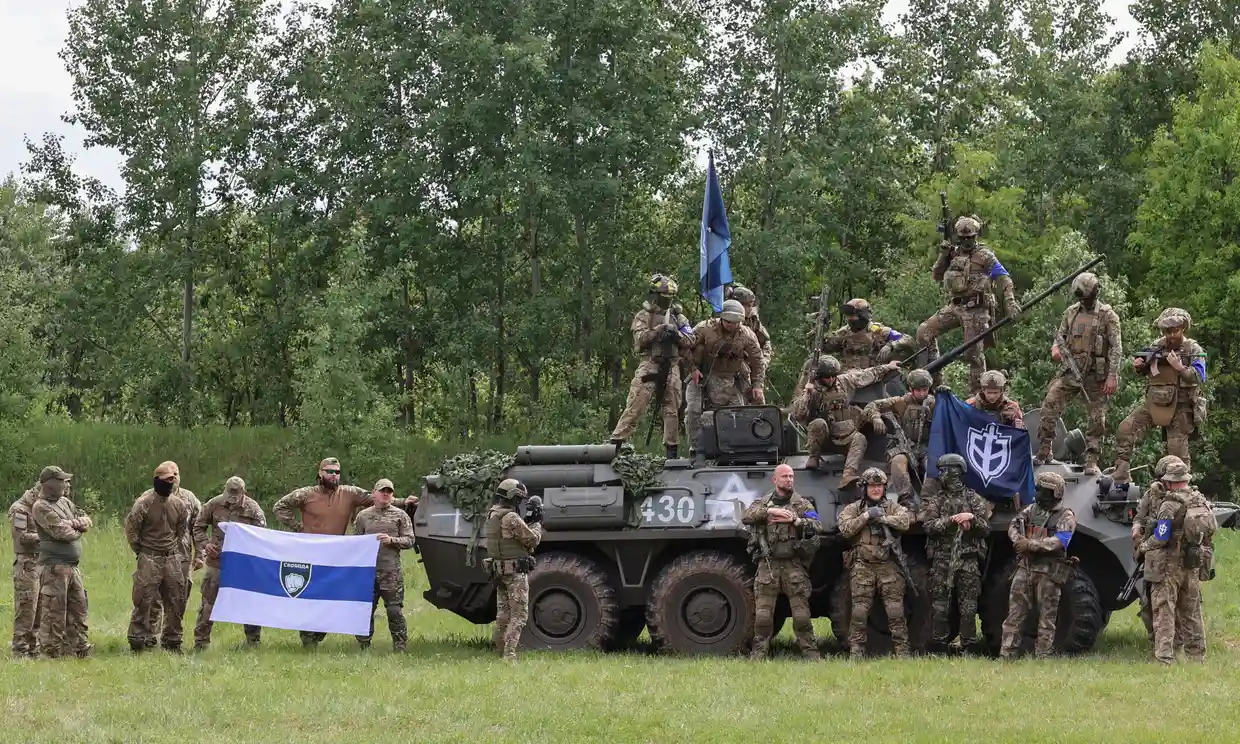 Members of the Russian Volunteer Corps and Freedom of Russia Legion in Kharkiv in May. Photograph: Sergey Kozlov/EPA