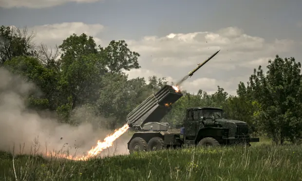 Ukrainian troops fire rockets towards Russian positions at a frontline in the Donbas region, Defense Express