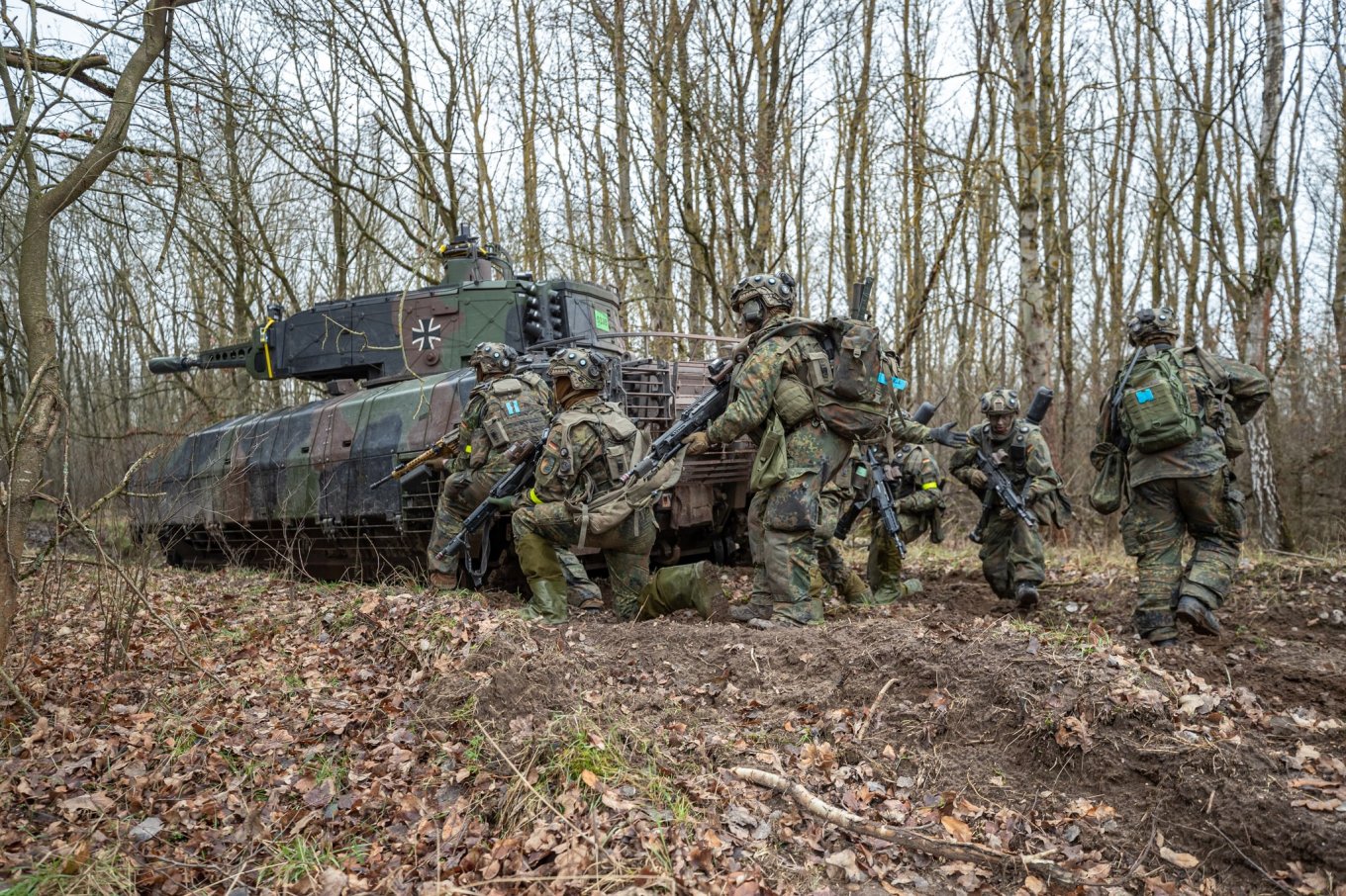 German soldiers during training with Marder IFVs